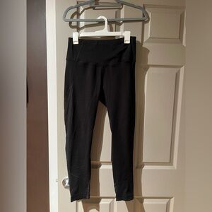 Yogalicious workout pants. Cute mesh calf detail on back. Size L.